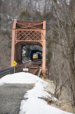 CSX 697 exits the south portal of Kingston Tunnel