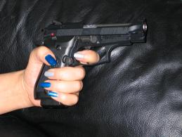 Let's see, which nail color goes best with the Beretta...?