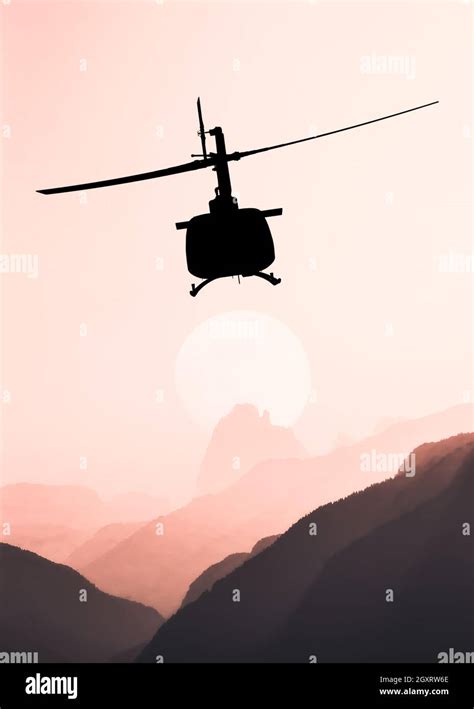 American utility military helicopter in the flight Stock Photo - Alamy