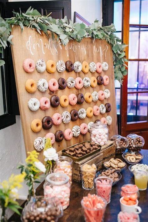 rustic greenery wedding donut wall #weddings #weddingdecors # ...