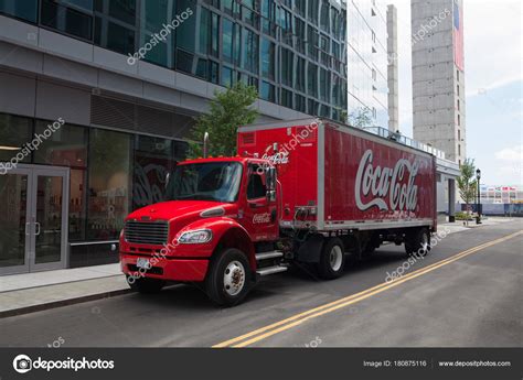 Typical Coca Cola red truck near the new luxury condos in Boston ...