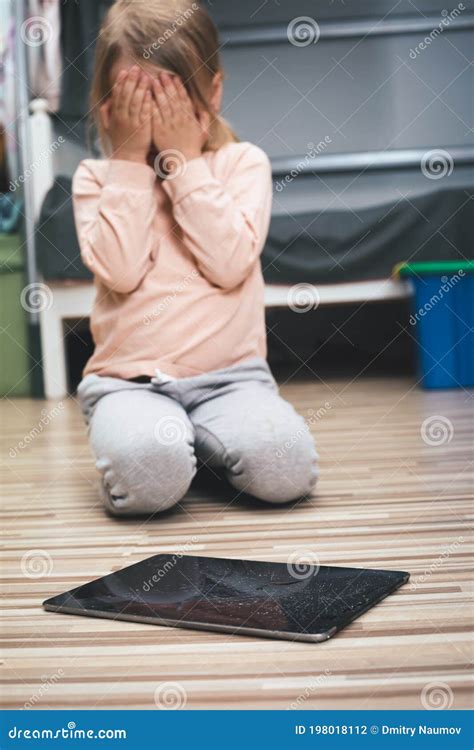 Upset Child Crying Over Broken Tablet Computer Stock Photo - Image of ...