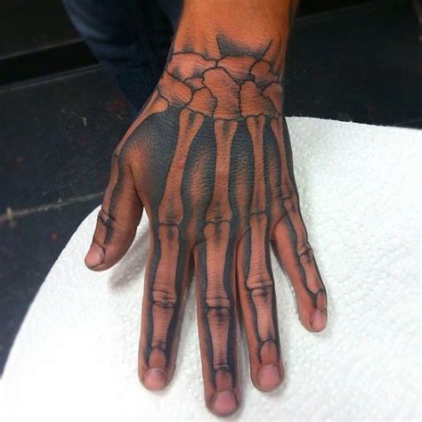 Aggregate 74+ skeleton hand tattoos best - in.cdgdbentre