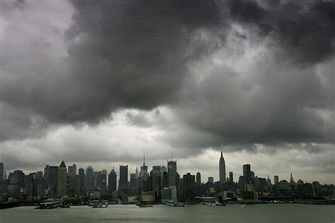 A Low Layer Of Dark Clouds Hangs Over by New York Daily News Archive