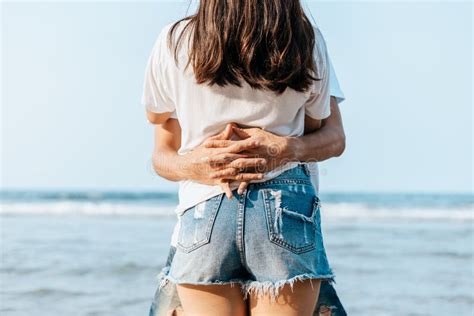 Romantic Couple Having Love and Hug on the Beach Stock Photo - Image of ...