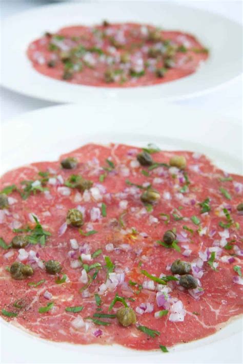 Beef Carpaccio with Capers, Parsley and Truffle Oil - Chefs Pencil