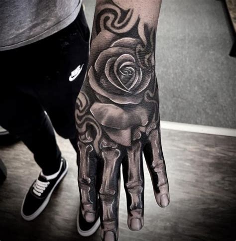 The Art of Ink: The Rose Skeleton Hand Tattoo | Art and Design