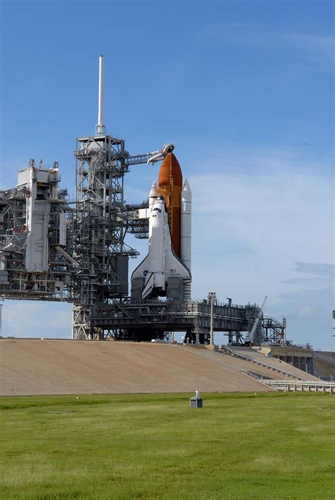 ESA - Space Shuttle Discovery stands on the launch pad ready for the ...