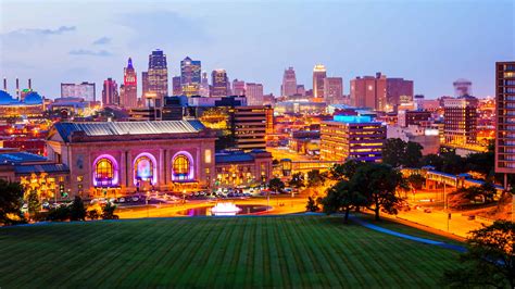 Kansas City, Missouri Skyline at Night (logos blurred) | Vibration ...