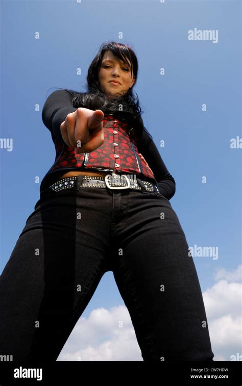 woman pointing into the camera Stock Photo - Alamy