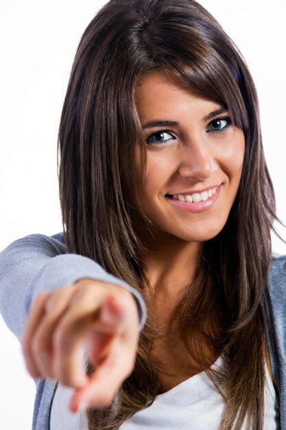 Premium Photo | Portrait of woman pointing at camera