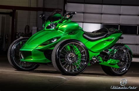 Green Can-Am Spyder Motorcycle in Garage