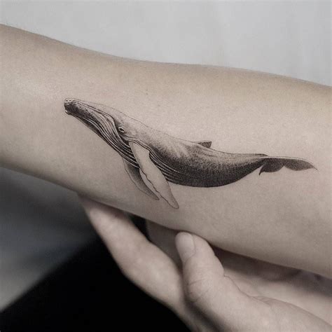 Micro-realistic whale tattoo on the inner forearm. Whale Tail Tattoo ...