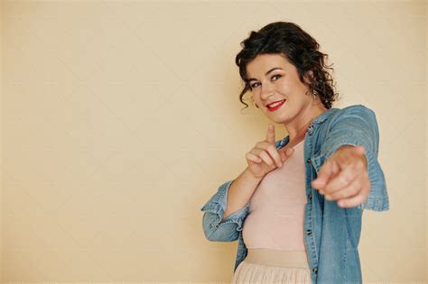 Attractive Woman Pointing At Camera - Stock Photos | Motion Array