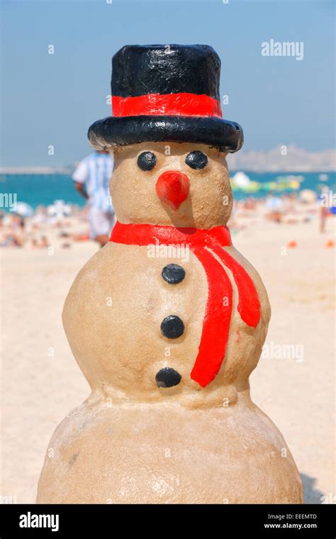 Snowman on the beach, Dubai, Jumeirah Beach Residence Stock Photo - Alamy