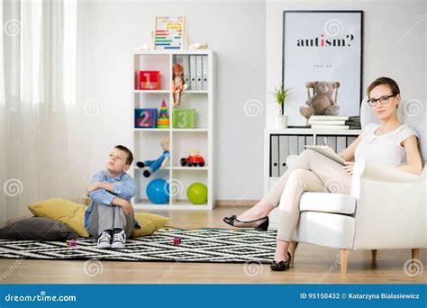 Boy with his therapist stock photo. Image of anxiety - 95150432