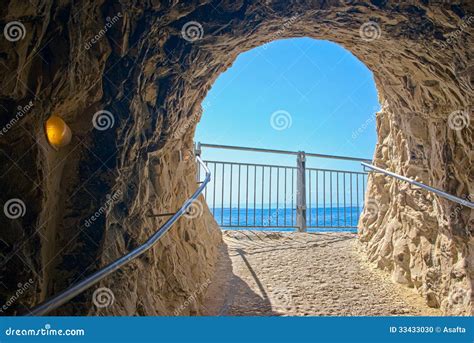 Cave exit stock photo. Image of beam, blue, exit, frame - 33433030