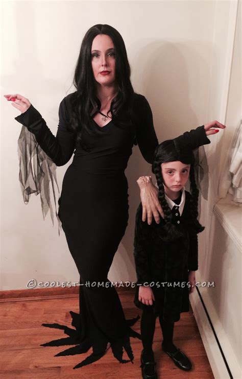 Cool Homemade Mom and Daughter Couple Costume: Morticia and Wednesday ...