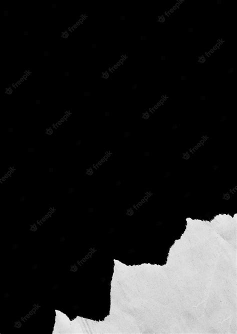 Premium Photo | Pieces of torn paper on black background with copy ...