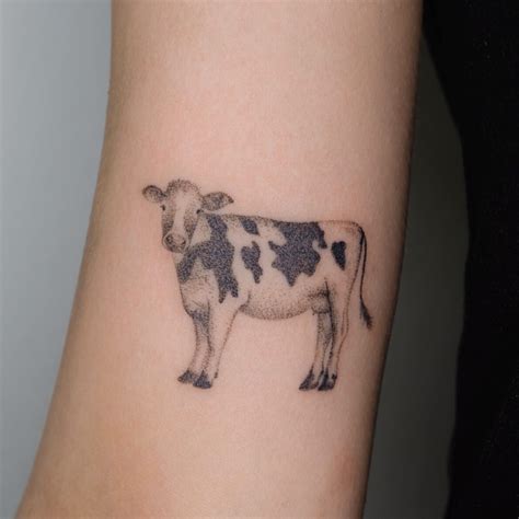 Top 76+ traditional cow tattoo - Giày cao gót nữ