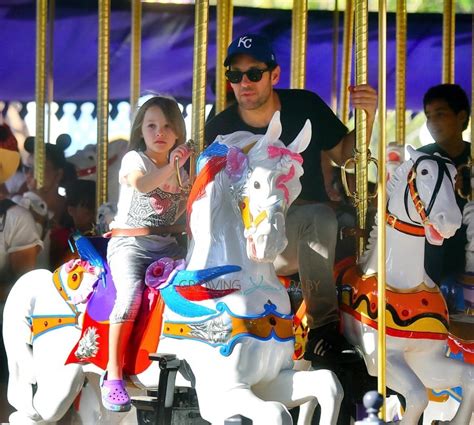 Paul Rudd and his daughter Darby enjoy a ride at King Arthur Carrousel ...