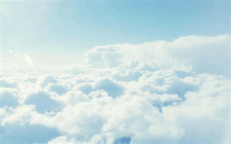 Download A View Of Clouds From The Sky | Wallpapers.com