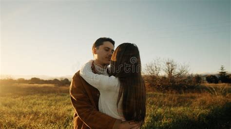 Romantic Couple Hugging Outdoor at Sunset Light Stock Photo - Image of ...