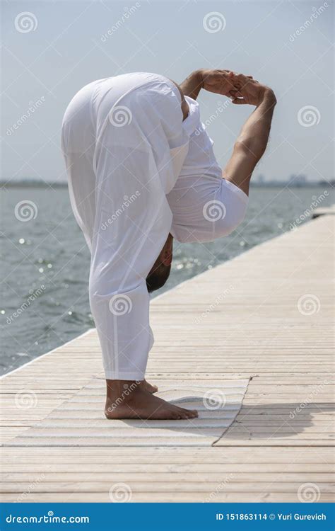 Man Practice Yoga on the Beach at Sunset Stock Photo - Image of ...