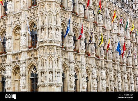 Ancient stone building facade with big windows, old Europe. European ...