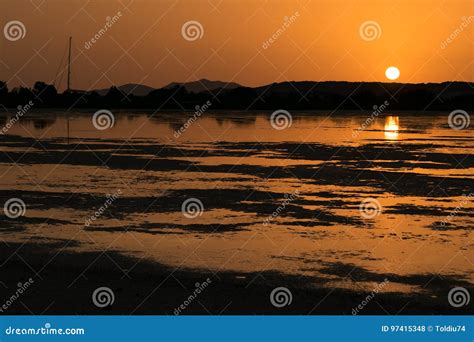 Sunset on the Pond of Pink Flamingos in Chia, Sardinia. Stock Photo ...