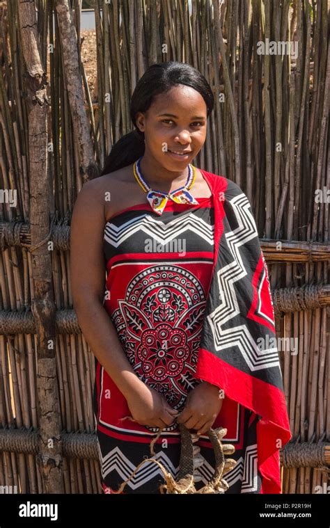 Swazi girl in traditional clothing, Mantenga Cultural Village ...