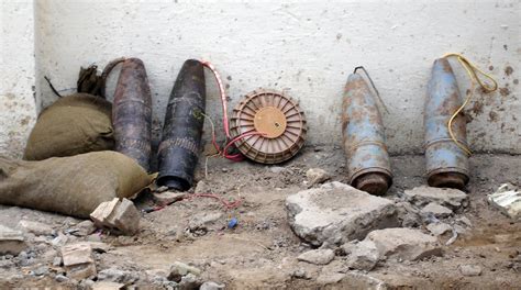 An improvised explosive device (IED) made by rigging four artillery ...