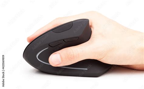 Hand using a modern ergonomic wireless computer mouse, holding and ...