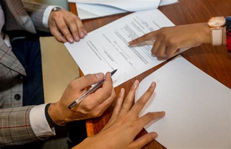 People signing documents stock photo. Image of cheching - 196965616