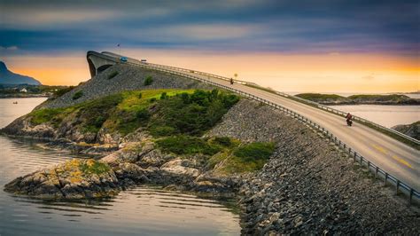 Landscape photography of island concrete bridge, motorcycle, Atlantic ...