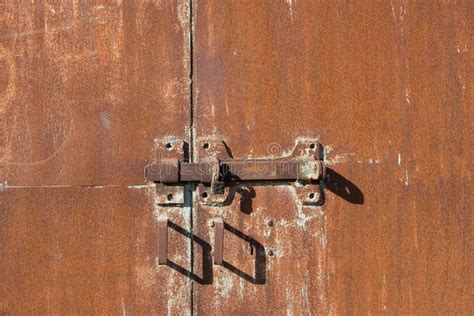 Texture of a Rusty Gate with a Hinged and Padlock Lock. Gates with Door ...