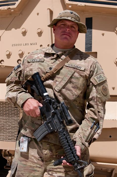 Soldier lives dream of serving in military, honors father | Article ...