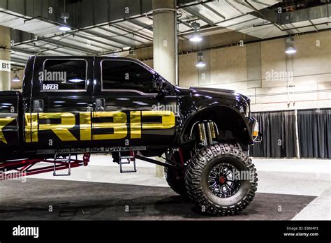 A large lifted custom Ford Truck in the Aftermarket manufacturers ...