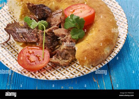 Greek roast lamb Stock Photo - Alamy