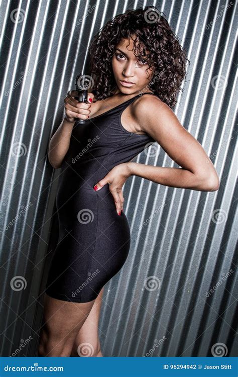 Woman Pointing Gun stock photo. Image of hair, hand, shoot - 96294942