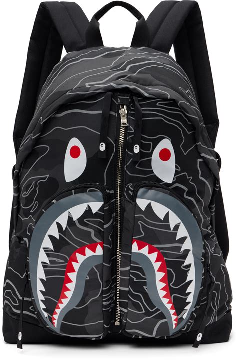 BAPE: Black Layered Line Camo Shark Backpack | SSENSE Canada