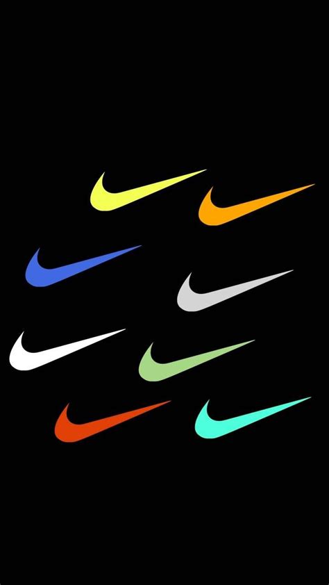 the nike logo is multicolored in different colors on a black background ...