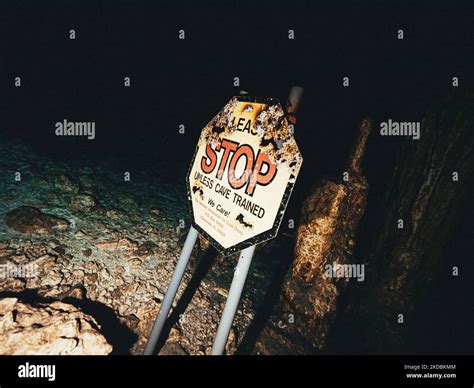 An entrance stop sign near an underwater cave in Mexico Stock Photo - Alamy