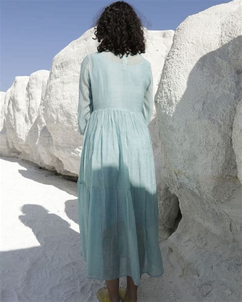 Light teal blue tiered dress by Tatwa Designs | The Secret Label