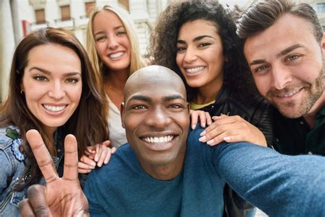 Free Photo | Multiracial group of young people taking selfie