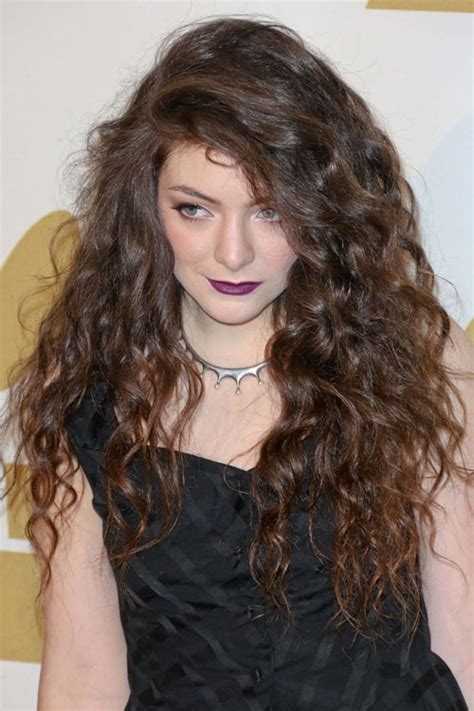 Lorde Curly Medium Brown Side Part Hairstyle | Steal Her Style