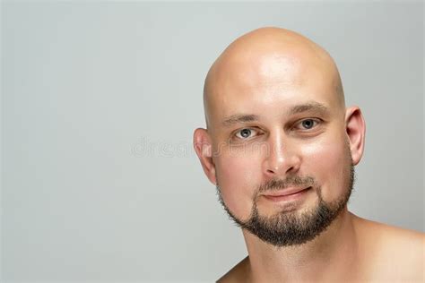 Attractive Smiling Bald Man on Gray Background in Studio Stock Photo ...