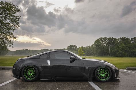 Peculiar Black Nissan 350Z Rocking Green Avant Garde Wheels — CARiD.com ...