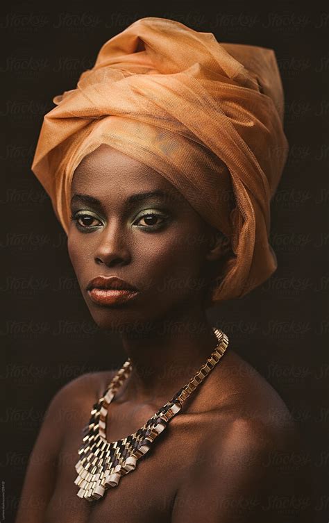 "African Woman With An Orange Turban" by Stocksy Contributor "Lumina ...