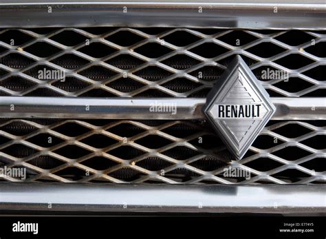 Renault badge on a Renault 4 classic French small car Stock Photo - Alamy